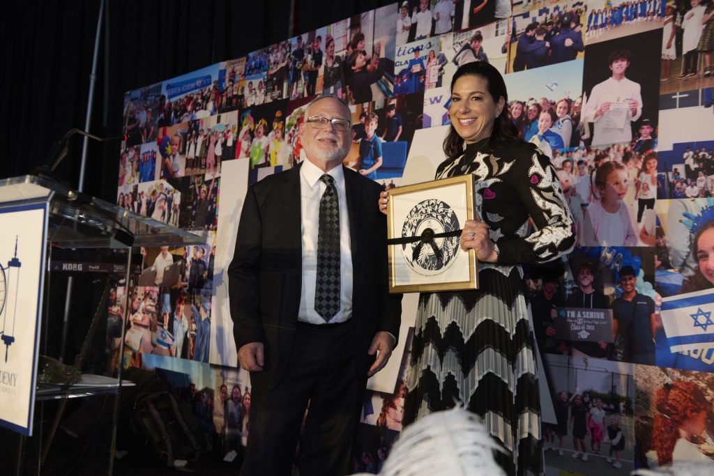 Two adults posing at Hebrew Academy's 76th Annual Light the Path Gala.