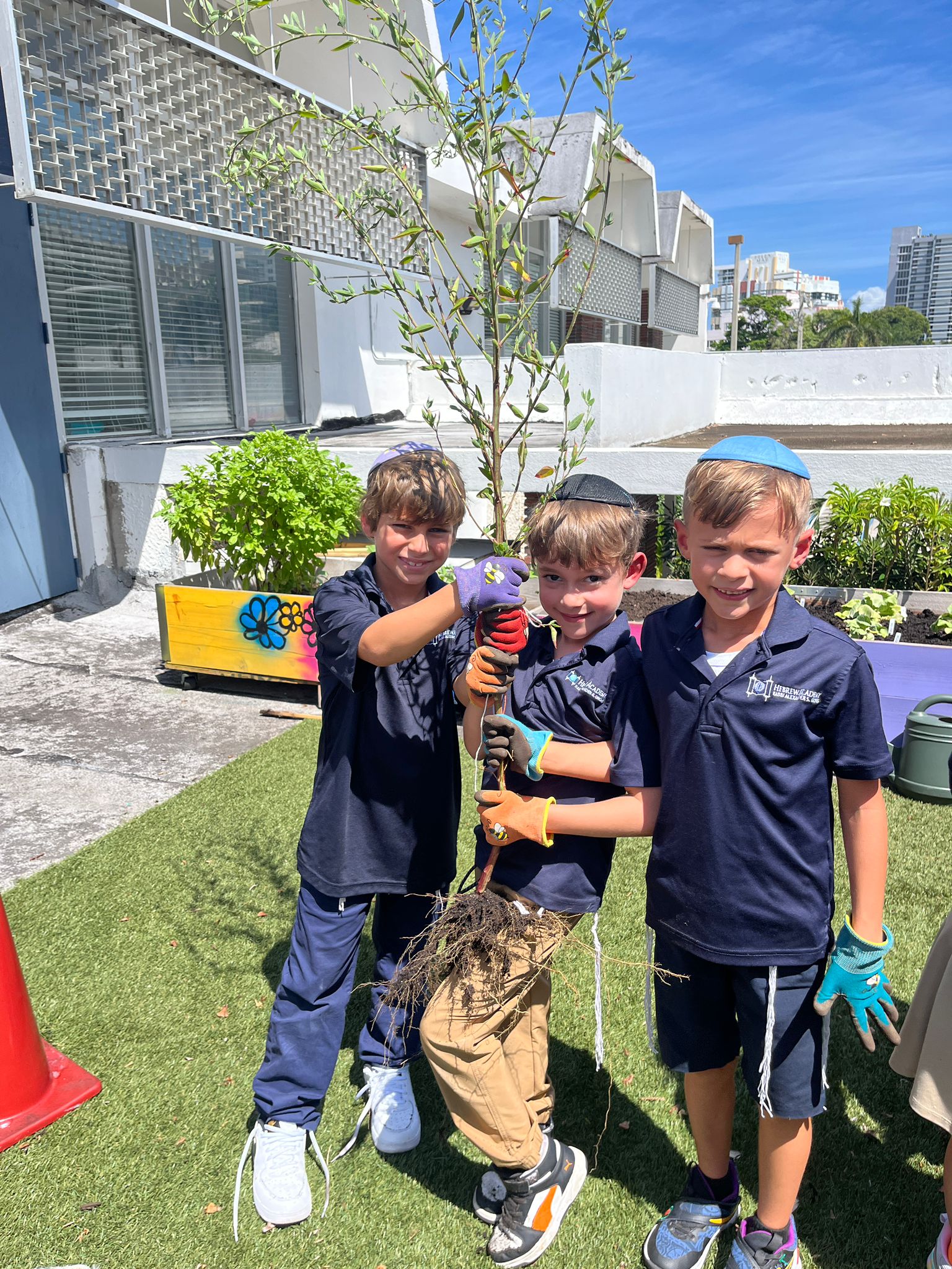 Second Graders Learn to Share Through Gardening and Torah